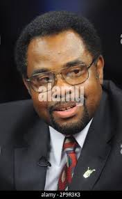 FILE ** In this April 19, 2008 file photo, West Virginia football coach  Bill Stewart watches from the sidelines with offensive players Tyler Rader  (88) and Wes Lyons (4) during the