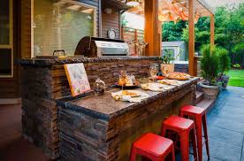 (via weber design group) 12. 20 Spectacular Outdoor Kitchens With Bars For Entertaining