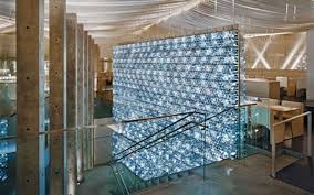 Garden glass bottle retaining wall. Plastic Bottle Homes And Greenhouses Insteading