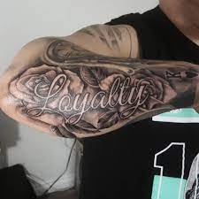 Music word tattoo design for forearm. 101 Amazing Loyalty Tattoo Designs You Must See