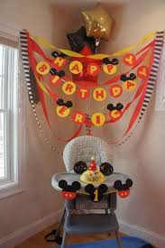 Birthday Banner With High Chair Set Up Mickey 1st Birthdays Mickey Mouse 1st Birthday Mickey Mouse First Birthday