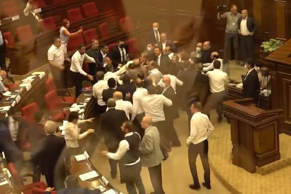 Bottles fly in Armenia Parliament brawl