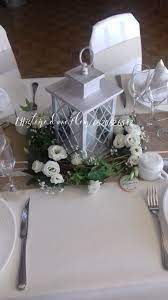 centre de table lanterne couronne de feuillage et fleurs centre de table decoration mariage decoration