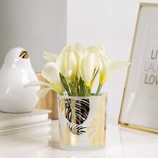 • plastic, polyester and wire. Monstera Leaf Etched Gold Mirror 3x3 Glass Hurricane Vase Metro Element