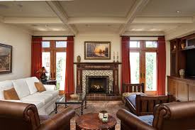 Living room two tone walls yellow paint colors. Craftsman Living Room With Rich Warm Tone Details White Sofa Brown Leather Chairs And Decorative Fireplace Surround Hgtv