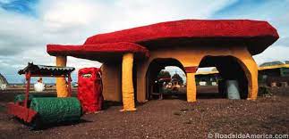 Although it's not an actual city, visitors can tour the large, colorful concrete buildings. Bedrock City And Raptor Ranch Williams Arizona