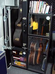 Client built guitar storage with set & forget humidification system. Guitar Storage Dry Cabinet