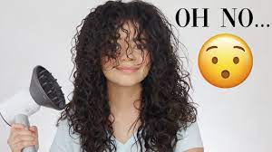 The key is to keep them long enough to allow room for shrinkage and have them cut according to your face shape and hair length. Curtain Bangs On Curly Hair Watch This Before Getting Them Youtube