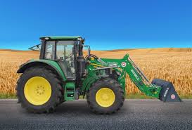 John deere 6120m utility tractor equipped with intelligent power management. John Deere 6120 M Stoll