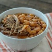 Pork roast is cooked all day with pinto beans in a seasoned sauce then shredded. Crockpot Express Pork Roast And Beans Simple And Seasonal