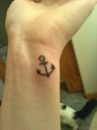 One more girlish idea is to combine an anchor with flowers, for example, bright color roses. 66 Anchor Tattoos For Wrist