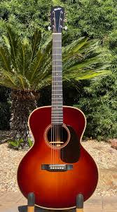 Visually these are quite different to the yw and ym models, from the lighter pickguard, to the martin d45 style torch inlay on the headstalk. High End Used Acoustic Guitars Walker Kim Guitars