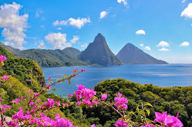 Lucia's western shore and you'll see two distinct volcanic peaks, known as the pitons. St Lucia In Pictures 16 Beautiful Places To Photograph Planetware