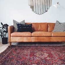 There is also so mild discoloration from wear and tear, but overall, the sofa looks good and is in good condition. West Elm Hamilton Leather Sofa In Burnt Sienna Westelm Midcenturymodern Sofaideas Affiliate Hamilton Sofa Round Sofa Tan Leather Sofas