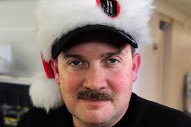 U.S. Army Chief Warrant Officer 5 Tom Travis, with