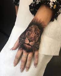 Pierced Inked Lion Hand Tattoo Hand Tattoos For Women Hand Tattoos