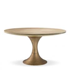 A small round side table next to square pieces of furniture will really pop. Dining Table Melchior Round
