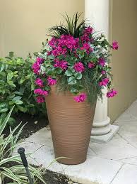 Bring in wildflowers, mixed grasses and fern leaves. 6 Reasonable Clever Ideas Large Artificial Plants Outdoor Artificial Plants Wall Diy Artif Artificial Plants Outdoor Potted Plants Outdoor Faux Outdoor Plants