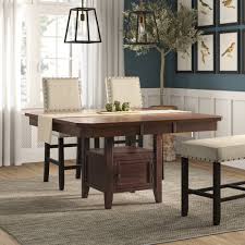 This leaf table opens up as a dining table or converts to a console table with the leaves lowered. Red Barrel Studio Johnsburg Butterfly Leaf Pedestal Dining Table Reviews Wayfair