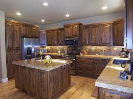 Beadboard panel with coat hangers sit below upper cabinets. Realtor Com Real Estate Listings Homes For Sale Rustic Kitchen Design Rustic Kitchen Cabinets Alder Kitchen Cabinets