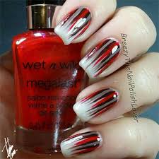 Producing nail art that can make people change emotions is a rare skill that very few people shine in the spotlight with this completely recognizable red nail design that you are able to notice from a mile away! 15 Black White Red Halloween Nails Art Designs Ideas 2017 Fabulous Nail Art Designs