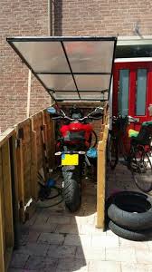 Pin Von Wheeler Hiram Auf Fahrrad Ideen Motorradgarage Holz Motorradgarage Garage Bauen