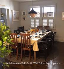 You can configure the table extender to add seating for two more people or up to four. The Best Tabletop Extension Pads Extend Your Dining Table