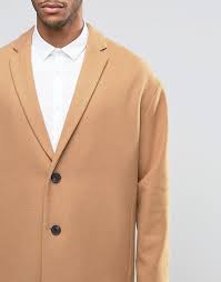 Overcoats are hugely in fashion this year and for good reason. Asos Wool Mix Overcoat With Drop Shoulder In Camel 64 Asos Lookastic