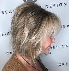 The entire hair is messy and casually parted to a side. 20 Youthful Shaggy Hairstyles For Fine Hair Over 50