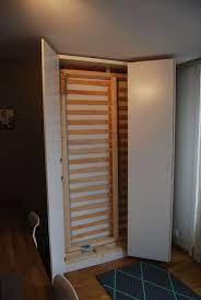 ikea murphy bed hack this would be perfect with a little cabinet built into the bottom to store the pillows a murphy bed ikea murphy bed plans murphy bed diy