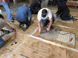 Duradek Installers Practice The Fine Art Of Heat Welding Using A Hot Air Heat Welder They First Overlap The Viny Outdoor Vinyl Flooring Vinyl Flooring Vinyl