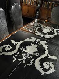 Table top and desk top coverings. Fine Carvings And A Etched Glass Top Highlight This Dining Set
