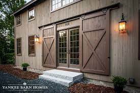 Homacer black rustic single track bypass sliding barn door hardware kit, for two/double doors, 14ft long flat track, classic design roller, for interior & exterior use (1 flat + 1 bent roller set) 4.6 out of 5 stars. Traditional Exterior Sliding Barn Doors Are The Perfect Feature For A Barn Style Home Yankee Barn Homes Exterior Barn Doors Barn Style House
