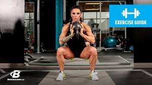 Push into the heels to stand. How To Do A Kettlebell Sumo Squat Exercise Guide Youtube
