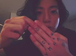 Arti Kata Tato Jk Ditangan