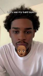 Taking A Picture of A Bald Head