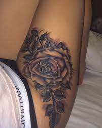 Colorful flower thigh tattoos are by far the most popular, and this is especially true of rose tattoo designs. Pin On Tattoo S And Body Art