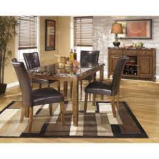 That's where the lacey dining room table comes in. Signature Design By Ashley Lacey Dining Room Table Rectangular Contemporary With Faux Marble Top Medium Brown Dining Tables Dining Room Furniture Ekbotefurniture Com