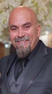 The procession is underway. Right now, just after 10 a.m., Manuel Garza is  making his final journey home — escorted from Eagle Pass to the bridge  where he served, and then to