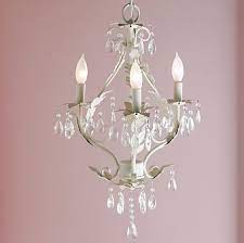 Get a modern chandelier to match your home decor or go with a rustic chandelier to create a natural aesthetic. Home Inspirations Romancing The Closet Spectacular Spaces Kids Chandelier Girls Room Chandelier Small Chandelier