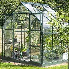 Les 5 Astuces De Rangement De Garage A Retenir Maison Verte Jardinage En Serre Serre Arriere Cour