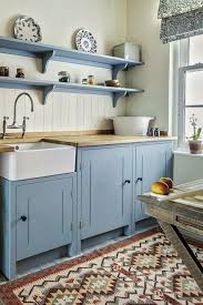 Wooden chair and floor accentuate the warm tone of the island. 25 Butcher Block Countertops For Your Kitchen Shelterness