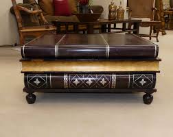 This juliette glass top coffee table will slay the design game. Encore Furniture Gallery Maitland Smith Leather Wrapped Stacked Book Coffee Table