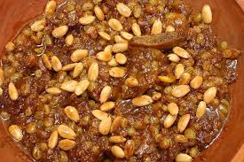 Moroccan Mrouzia Recipe Lamb Tagine With Raisins Almonds And Honey Recipe Moroccan Lamb Tagine Tagine Recipes Moroccan Food