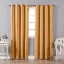What is the price range for orange blackout curtains? Burnt Orange Curtains Wayfair