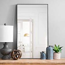 For the bedroom, a leaning floor mirror, door mirror, or dresser mirror is ideal. Black Wood Rectangle Framed Wall Mirror Kirklands