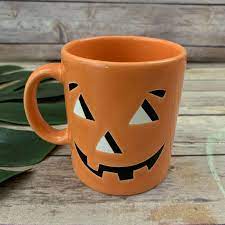 Pouring a witches brew into one of our halloween beer glasses accented with many different halloween themes like ouija, creepy dolls, scary clowns, and so much more! Waechtersbach Cup Pumpkin Cups Halloween Coffee Halloween Mug