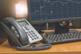 ip telephone with computer keyboard and monitor display