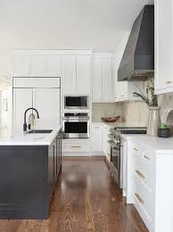 See more ideas about white shaker kitchen, shaker kitchen, white shaker. Black And White Kitchen With Black Range Hood Transitional Kitchen