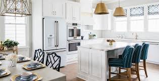 A white kitchen will definitely give your condo a sleek modern look. Black Kitchen Cabinets With White Appliances